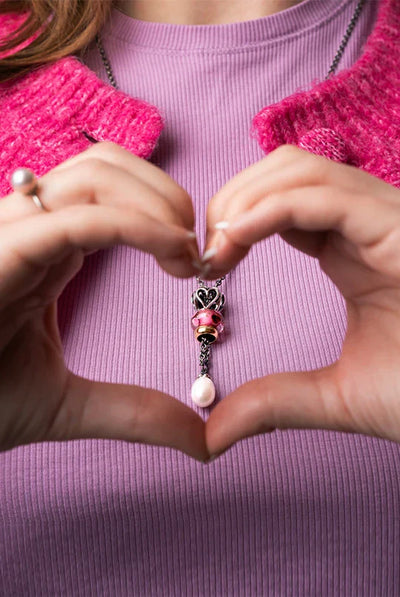 Trollbeads bangle with strawberry quarts, and a Cherub of Love Beaddaysi bead small round moonstone and 