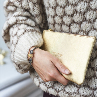 Goldene Kosmetiktasche Clutch